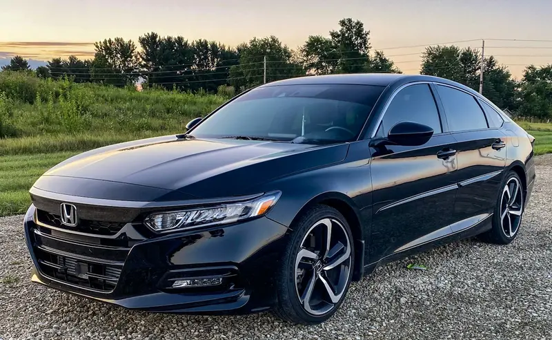 Black Honda Accord sedan parked outdoors